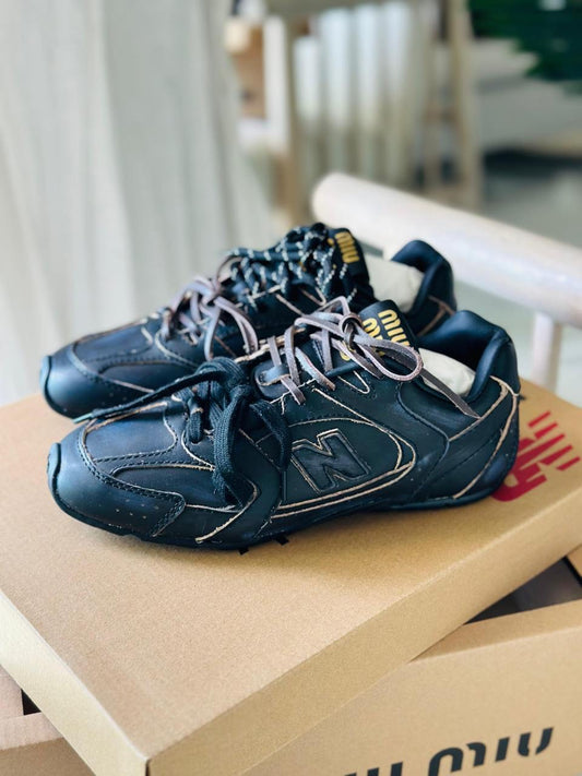 Miu Miu x New Balance Sneakers