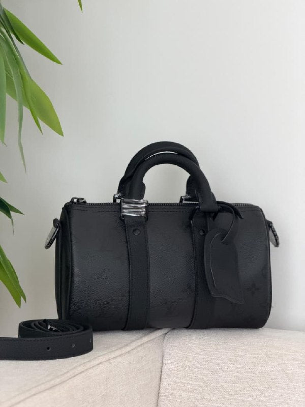 Louis Vuitton Handbag - Black Embossed