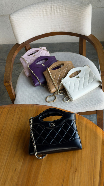 Chanel Handbag - Beige