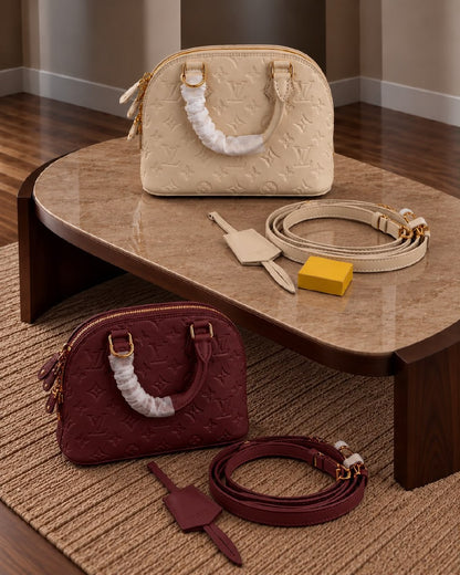 Louis Vuitton Embossed Dome Handbag - Burgundy, White