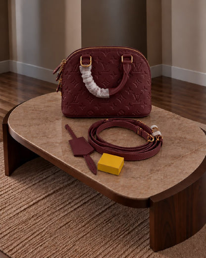 Louis Vuitton Embossed Dome Handbag - Burgundy, White