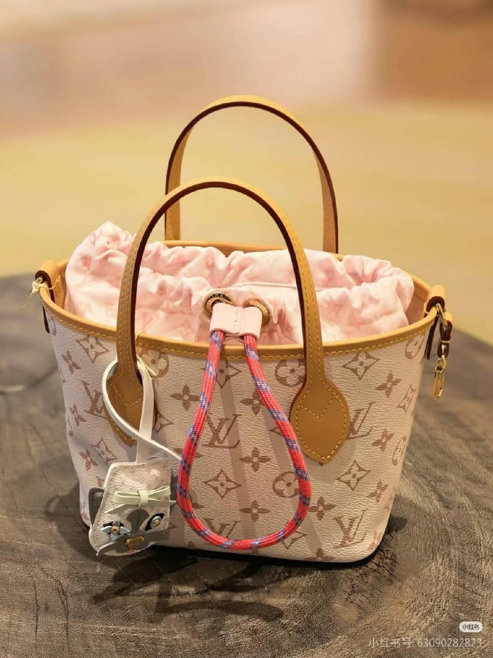 Louis Vuitton Drawstring Handbag - Beige Monogram