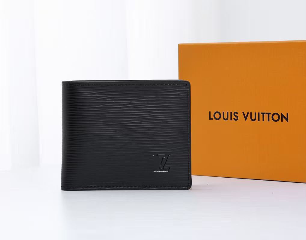 Louis Vuitton Ribbed Wallet - Black Embossed