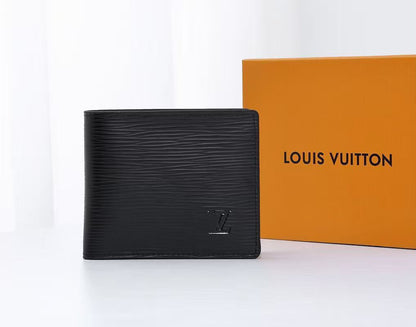 Louis Vuitton Ribbed Wallet - Black Embossed