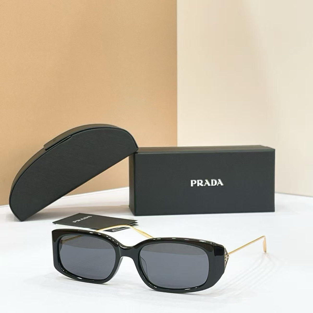 Prada Sunglasses - Black & Grey
