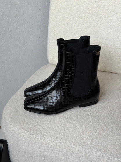 Chanel Boots - Black Embossed