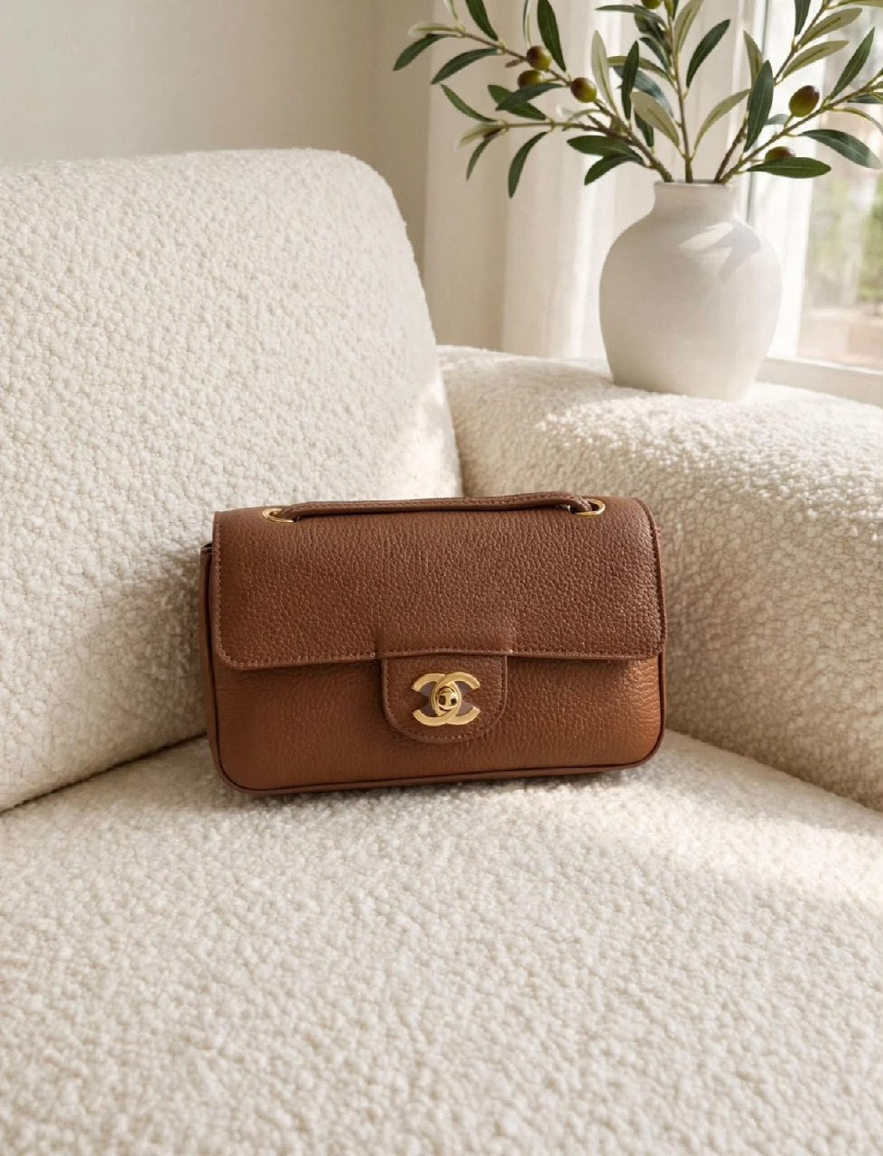 Chanel Pebbled Flap Handbag - Brown