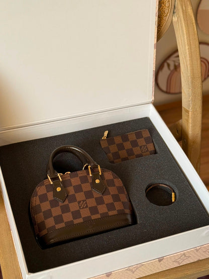 Louis Vuitton Alma Handbag - Brown
