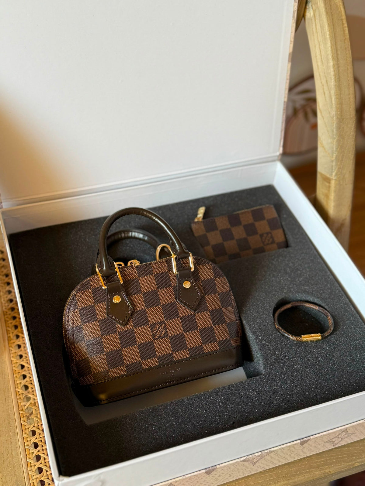 Louis Vuitton Alma Handbag - Brown