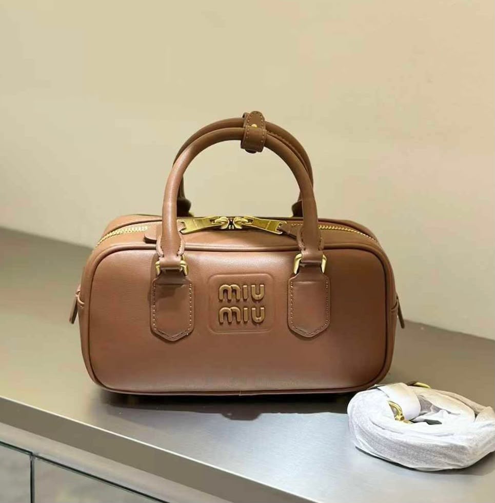 Miu Miu Handbag - Brown Embossed