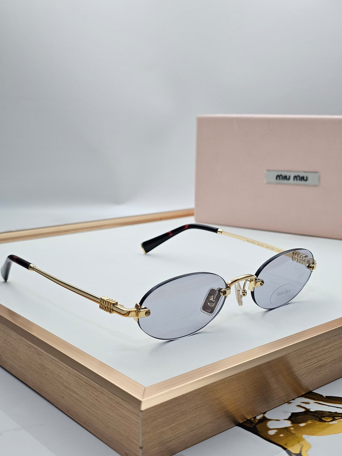 Miu Miu Rimless Oval Sunglasses - 