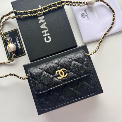 Chanel Quilted Crossbody Bag - Black Embossed