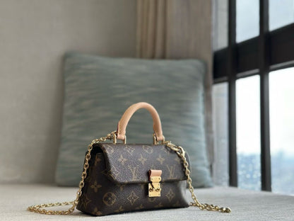 Louis Vuitton Handbag - Brown