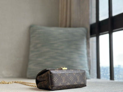 Louis Vuitton Handbag - Brown