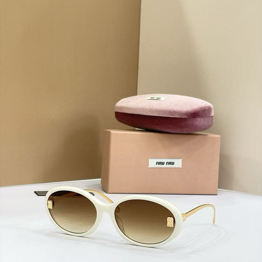 Miu Miu Oval Sunglasses - 