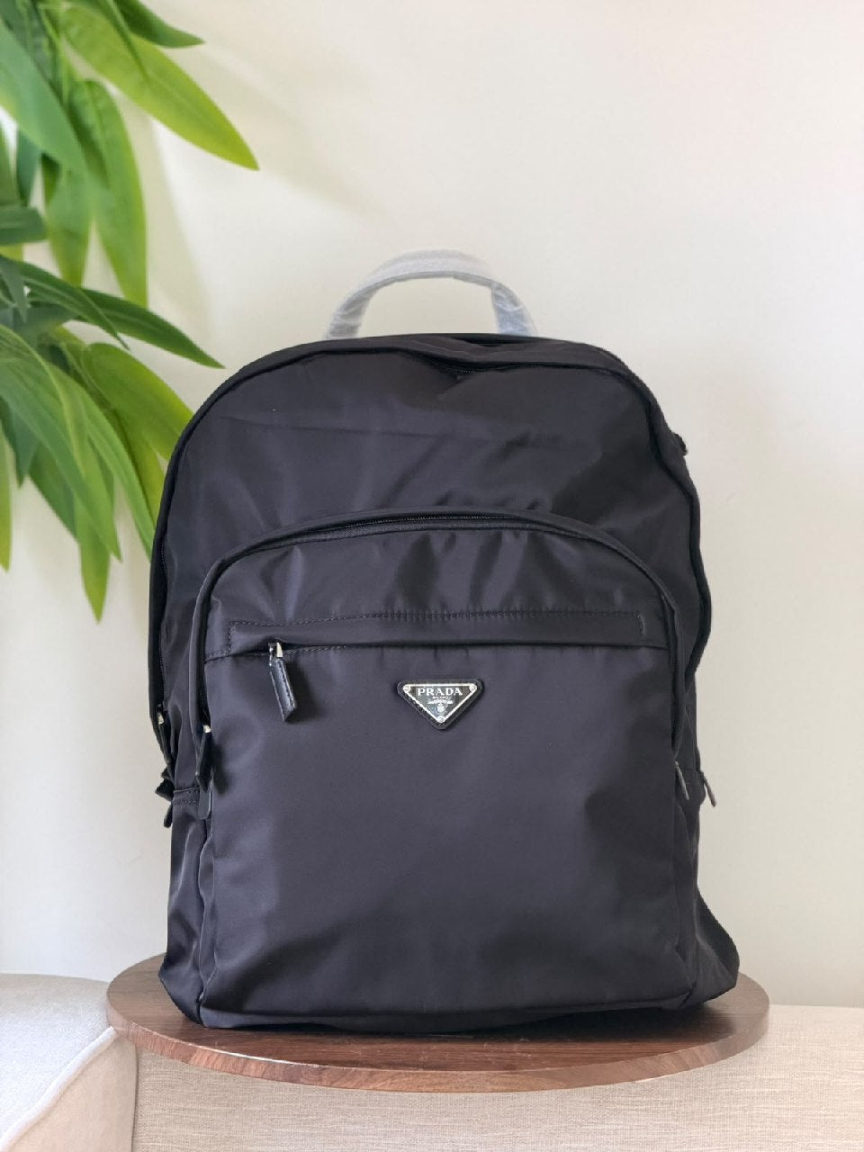 Prada Curved-Zip Backpack - Black
