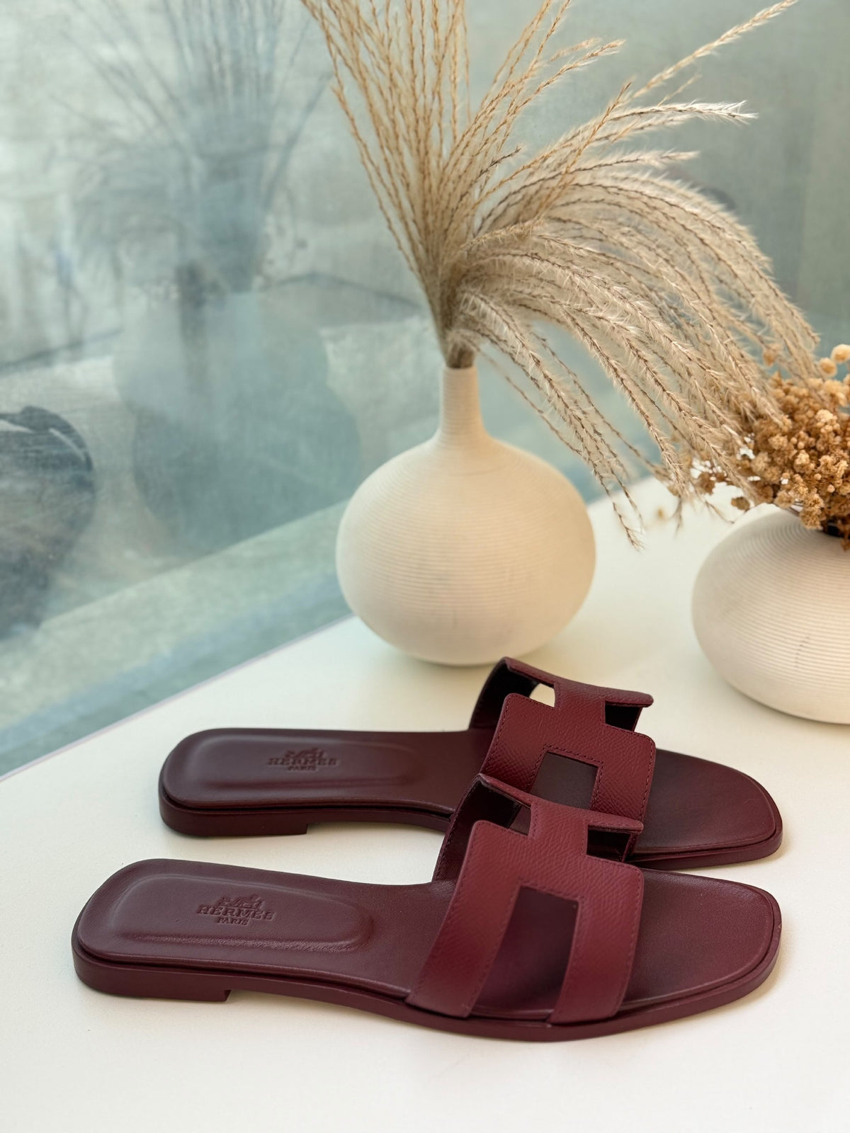 Hermès Slippers Textured H Strap - Burgundy