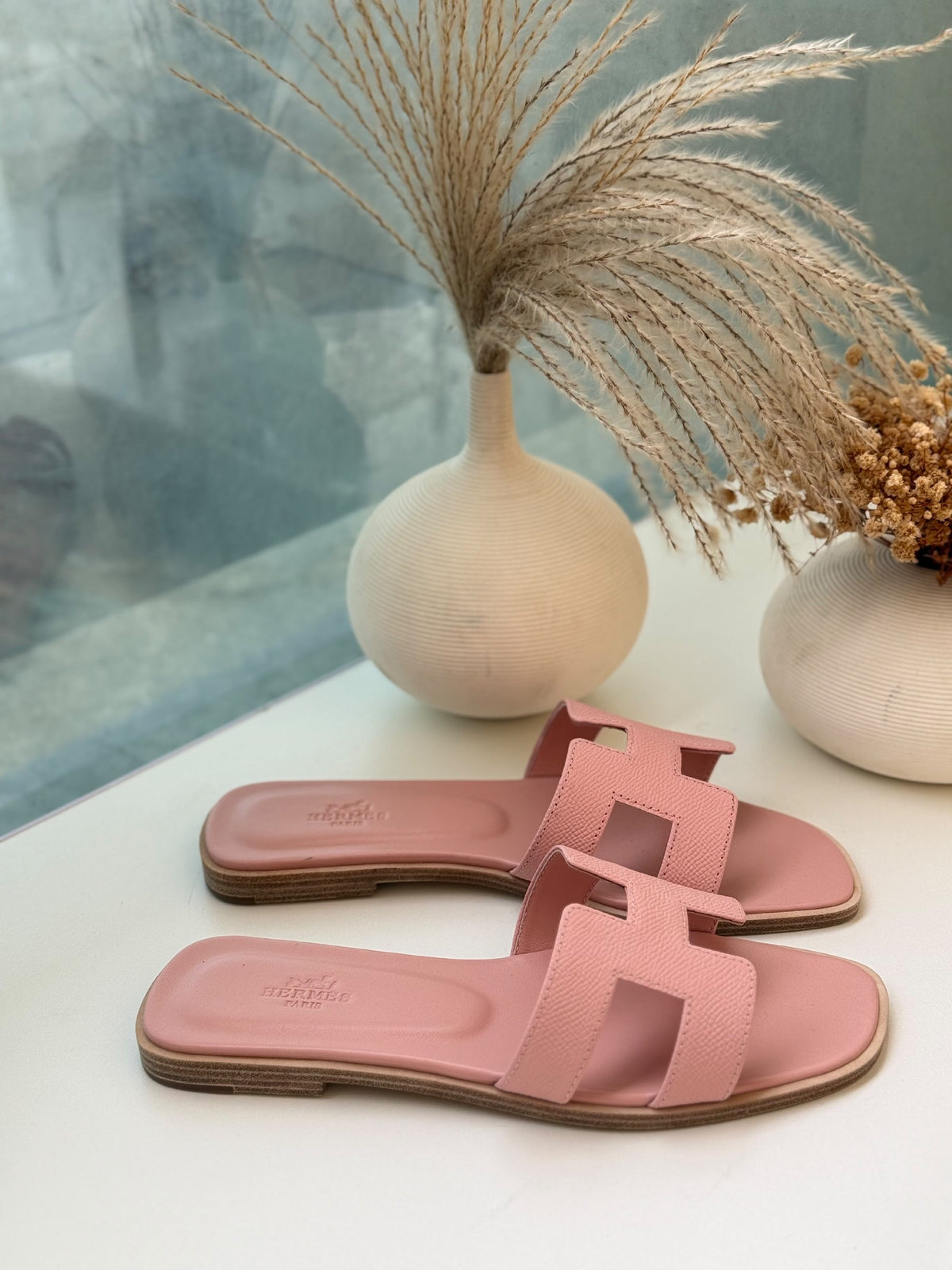 Hermès Slippers Textured H Strap - Pink
