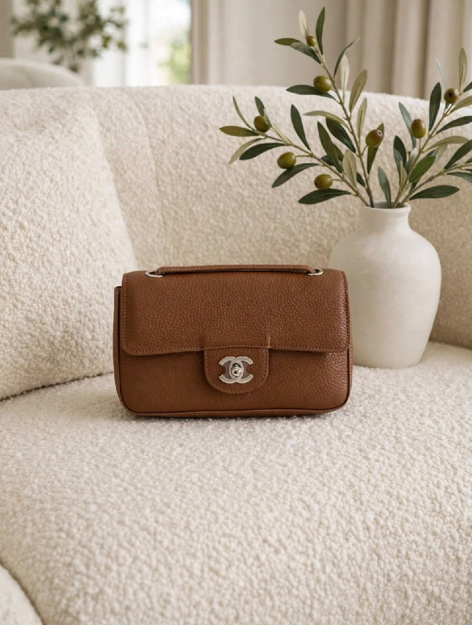 Chanel Pebbled Flap Handbag - Brown