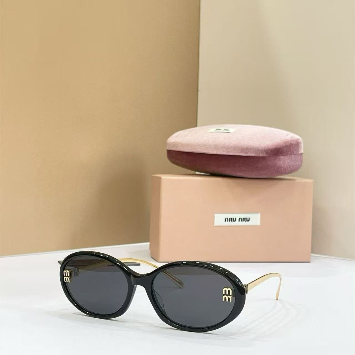 Miu Miu Oval Sunglasses - 