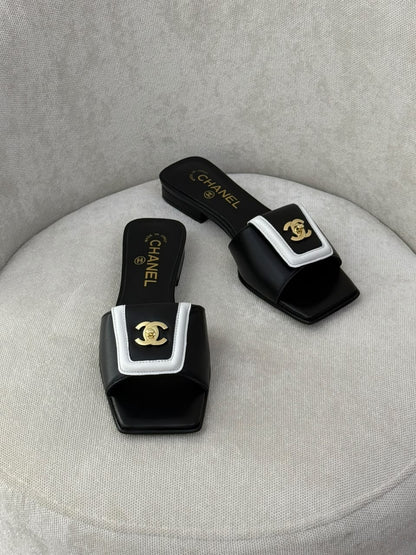 Chanel Slippers - Black & White