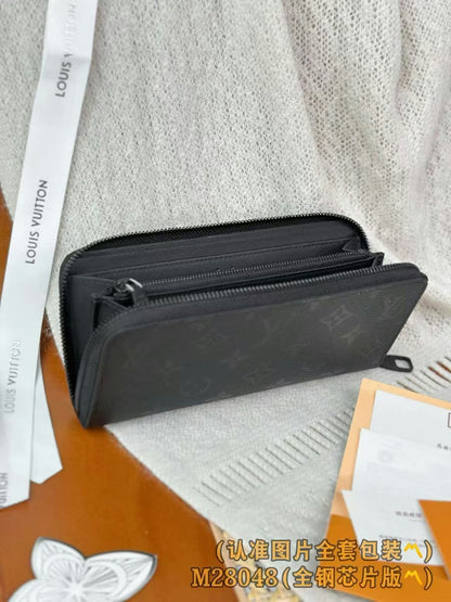 Louis Vuitton Wallet - Black Embossed