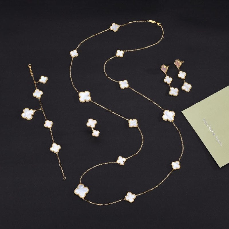 Van Cleef & Arpels Necklace, Earrings, Ring & Bracelet Set - White